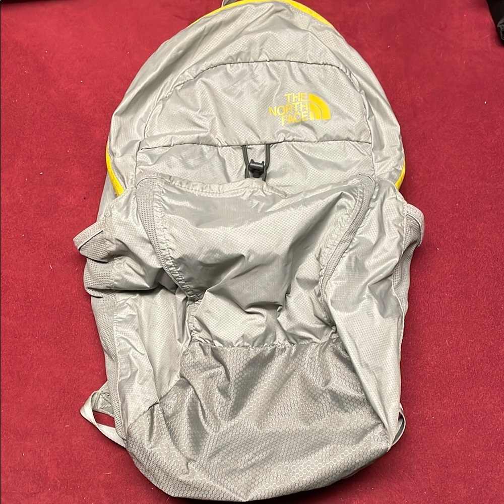 The North Face Gray and Yellow Backpack Lightweight and Water-Resistant